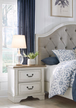 Load image into Gallery viewer, Brollyn King Upholstered Panel Bed with Mirrored Dresser, Chest and 2 Nightstands
